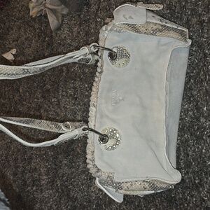 White suede Prada bag with 1 stain